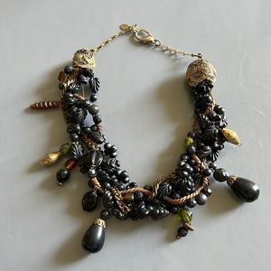 great accent piece in this necklace with black, gold, bronze and copper tones